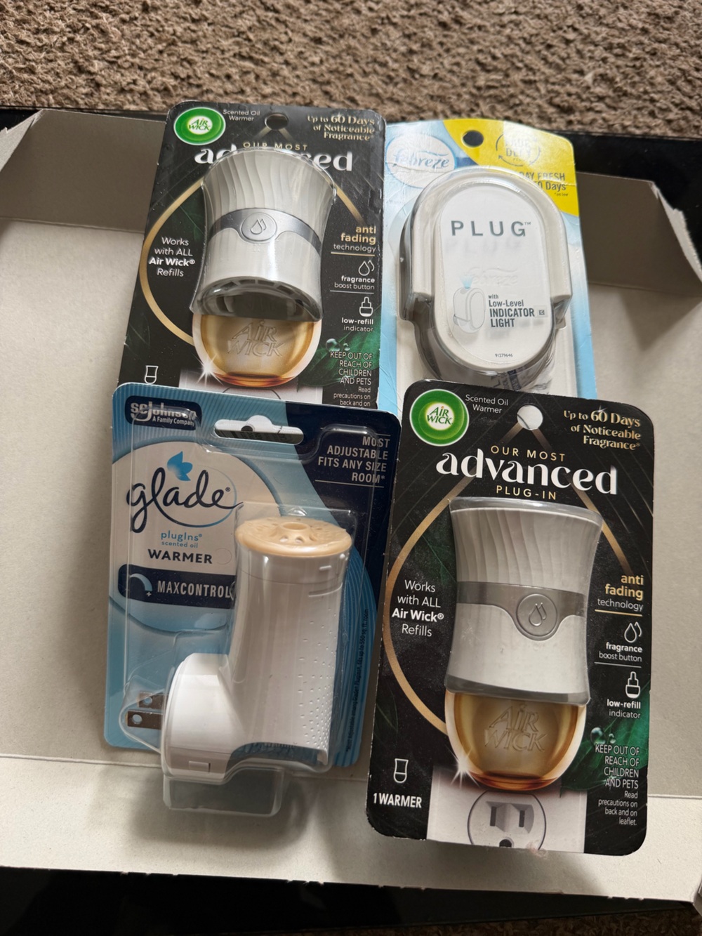 4 Brand New Plug-In Air Freshener Warmers – Air Wick, Glade & Febreze – Unopened